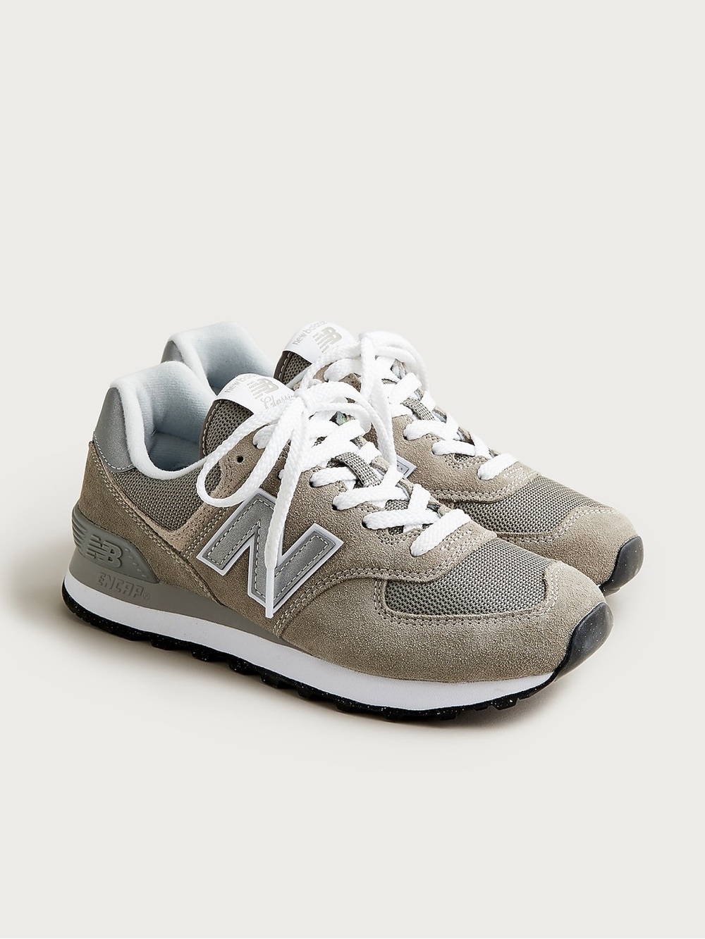 New Balance 574 sneakers in Grey and White Size 10.5 Women’s 9 Men’s